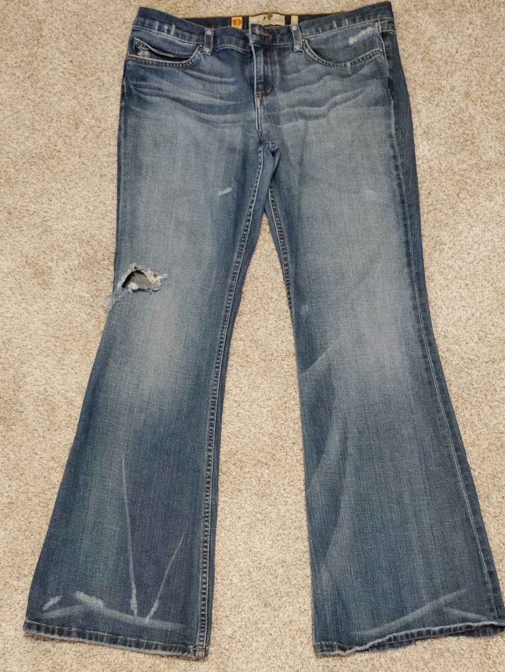 Juicy Couture Faded Blue Flare Jeans with Knee Rip